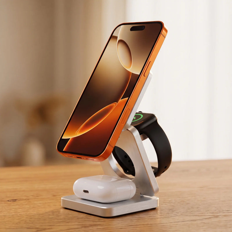 The charging stand, Brushed Silver, open with phone, watch and earbuds charging