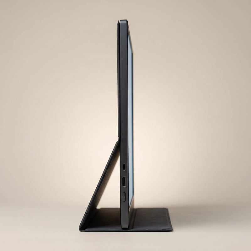 The portable monitor in profile, showing the thin panel and its stand
