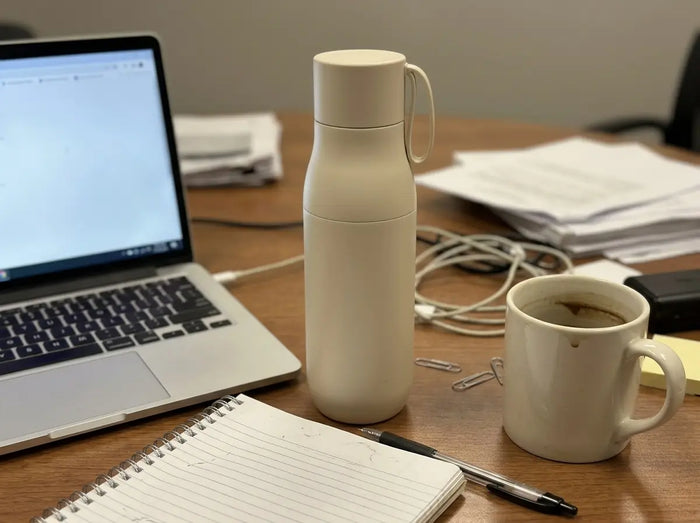 Customer photo, the water bottle in Ivory White on a desk