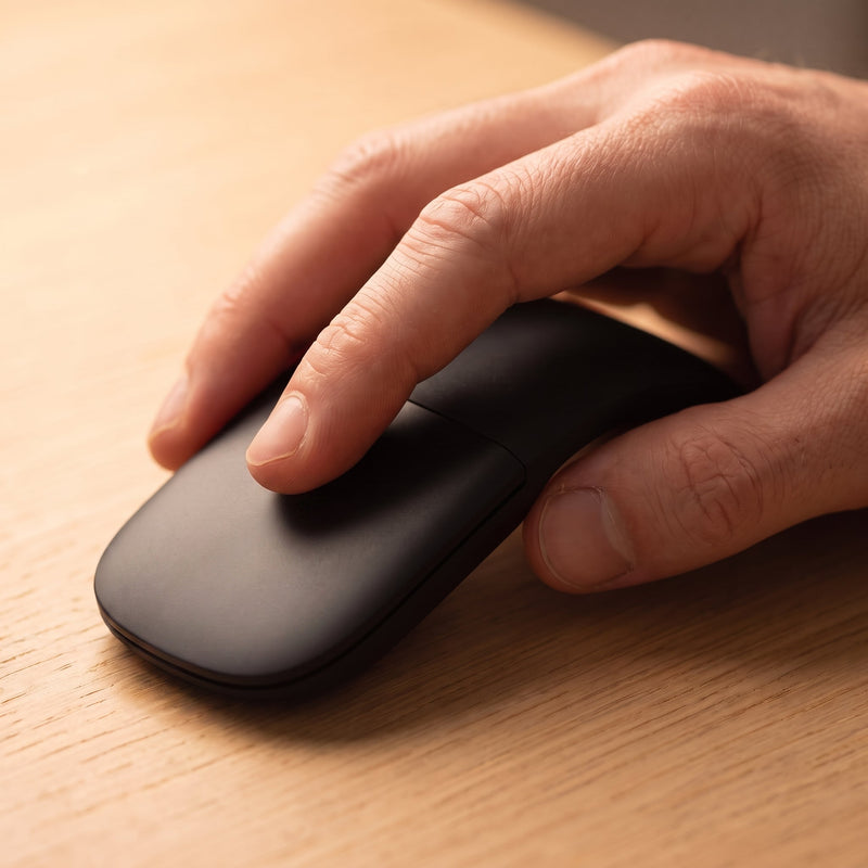 Folding Bluetooth Mouse — A touch strip, not a wheel