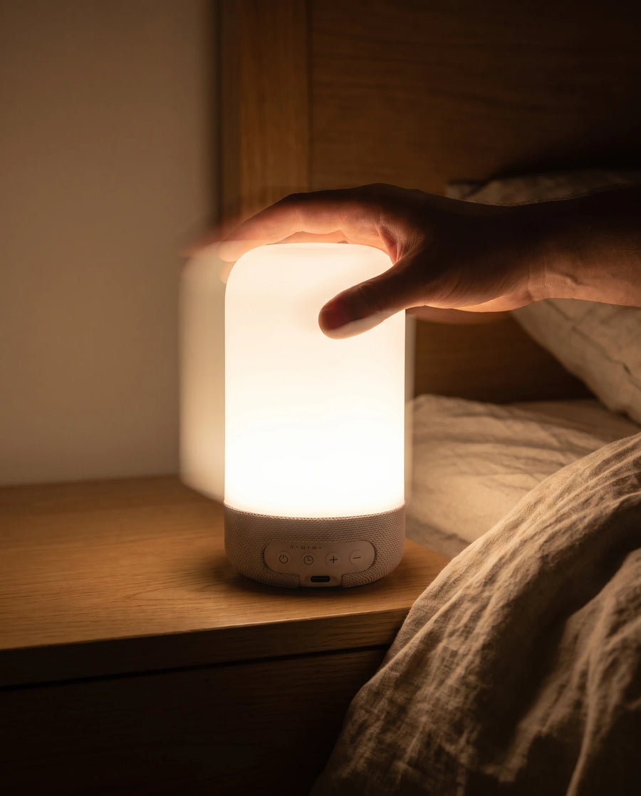 The bedside lamp — On the nightstand