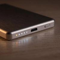 Slim Power Bank — It tells you where it stands