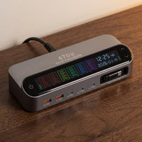The desk charging station in Brushed Aluminium, display lit