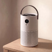 The portable air purifier in Linen White