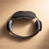 The Bluetooth sleep mask — top-down flat-lay of the open mask