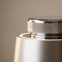 The car diffuser — the knurled chrome cap up close