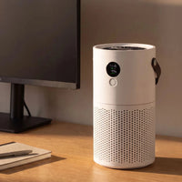 HEPA Air Purifier — The desk, before the room fills up