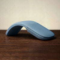The folding mouse in Mist Blue