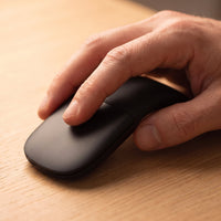 Folding Bluetooth Mouse — A touch strip, not a wheel