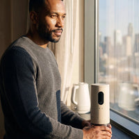 Burr Coffee Grinder — A hotel room with a kettle and nothing else