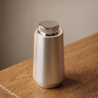 The car diffuser — cap and glow, from above